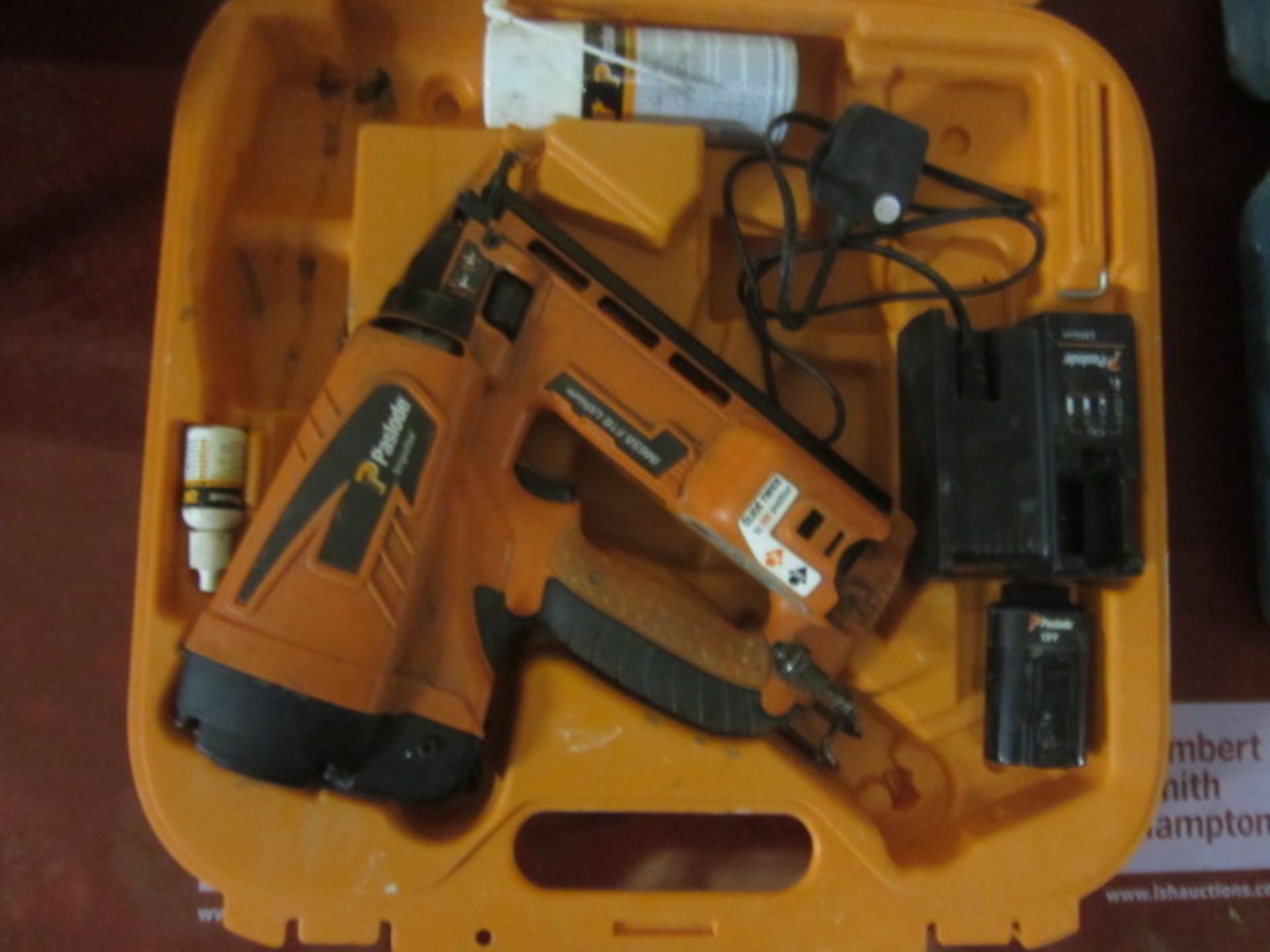 Paslode IM65A-F16 cordless second fix nail gun, 1 x charger, 1 x battery ** Located: Stoneford Farm,
