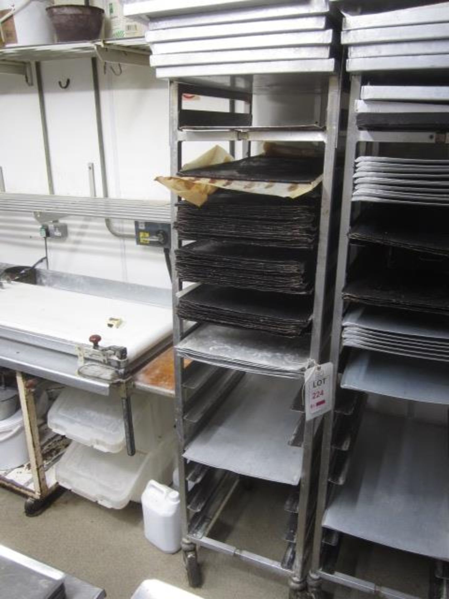Stainless Steel mobile multi tray rack, 460mm x 600mm x 1800mm to include various baking trays **
