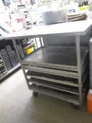 Stainless Steel mobile tray unit with worktop, 630mm x 870mm x 920mm **Located: Puddy Mark Café,