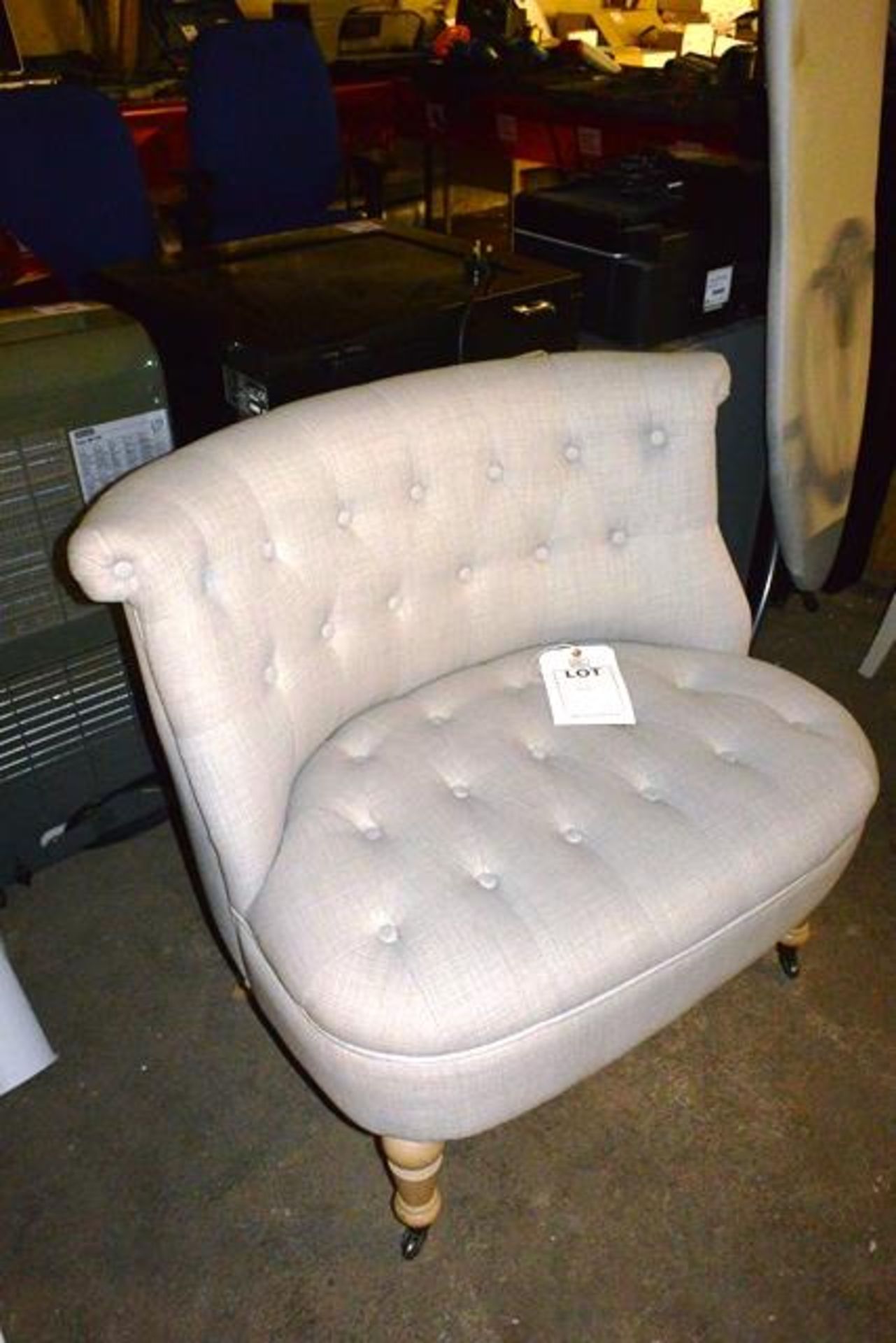 Cream cloth upholstered armchair ** Located: Stoneford Farm, Steamalong Road, Isle Abbotts, Nr