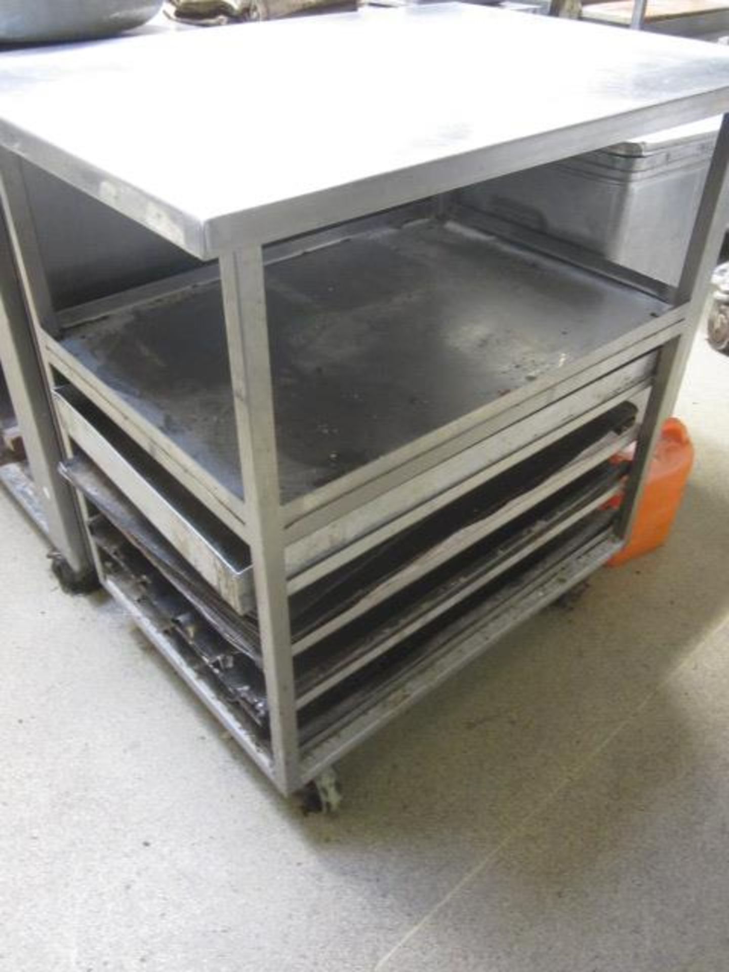 Stainless Steel mobile tray unit with worktop, 630mm x 870mm x 920mm **Located: Puddy Mark Café, - Image 2 of 2