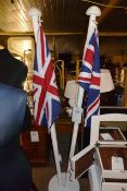 Two steel flag poles, with Union Jack flags ** Located: Stoneford Farm, Steamalong Road, Isle