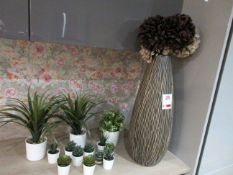 Assorted artificial plants with pots