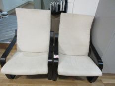 Two upholstered cream arm chairs