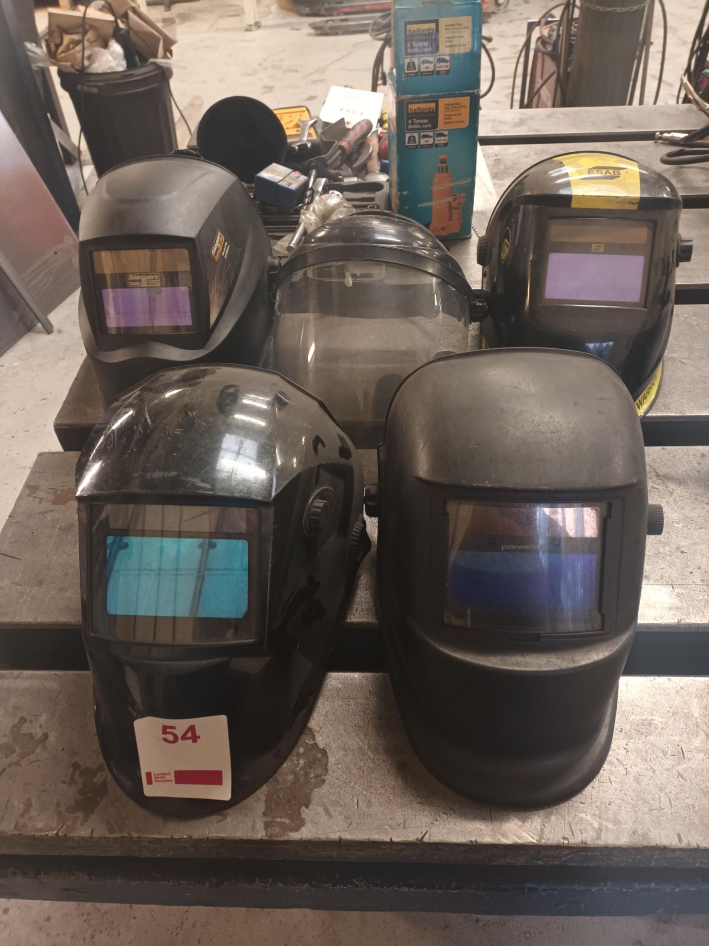Five various welding helmets