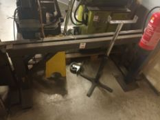 Two steel welded trestles and roll feed unit
