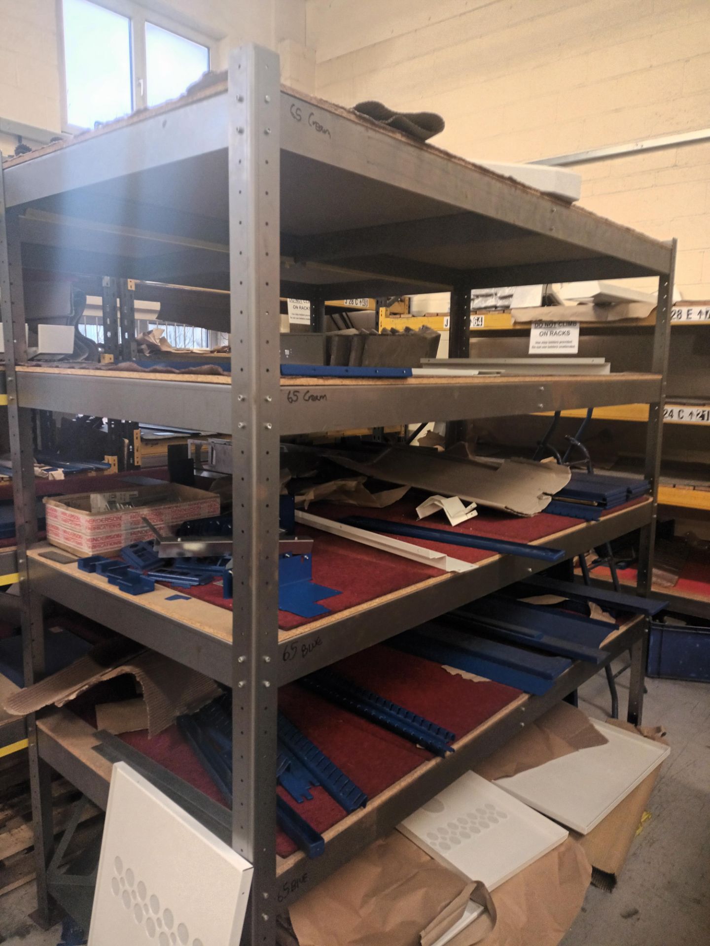 Five bays of heavy duty four tier racking units