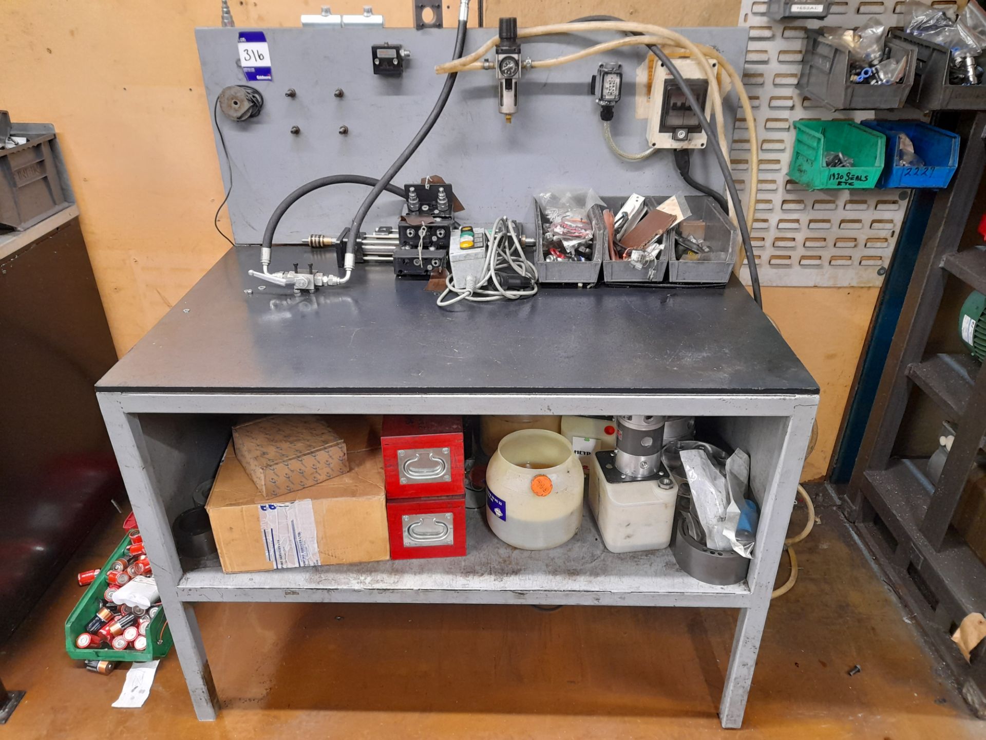 Fabricated work bench, with back panel, including electrical and air connections (Approximately 1200