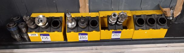 Quantity of HSK CNC tool holders, with assortment of tooling