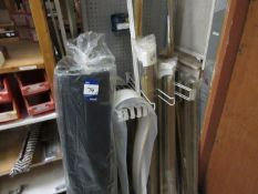 Quantity of various curtain track accessories and roll of weed barrier