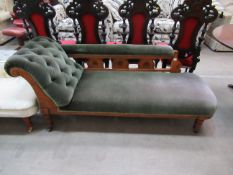 Green and carved wooden button backed chaise lounge
