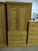 Pine double door wardbrobe on chest of three drawers