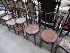 Four wooden chairs of various styles