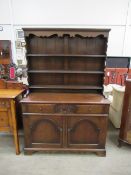 Dark Welsh dresser with an oak sideboard