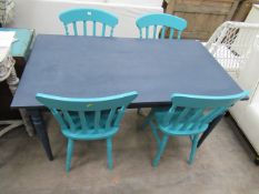 Painted dining table with four painted chairs