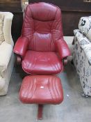 Leather burgandy chair with matching footstool