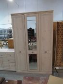 Tall triple wardrobe with matching chest of drawers