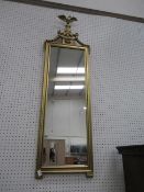 Gilt framed mirror with bird detail to the top