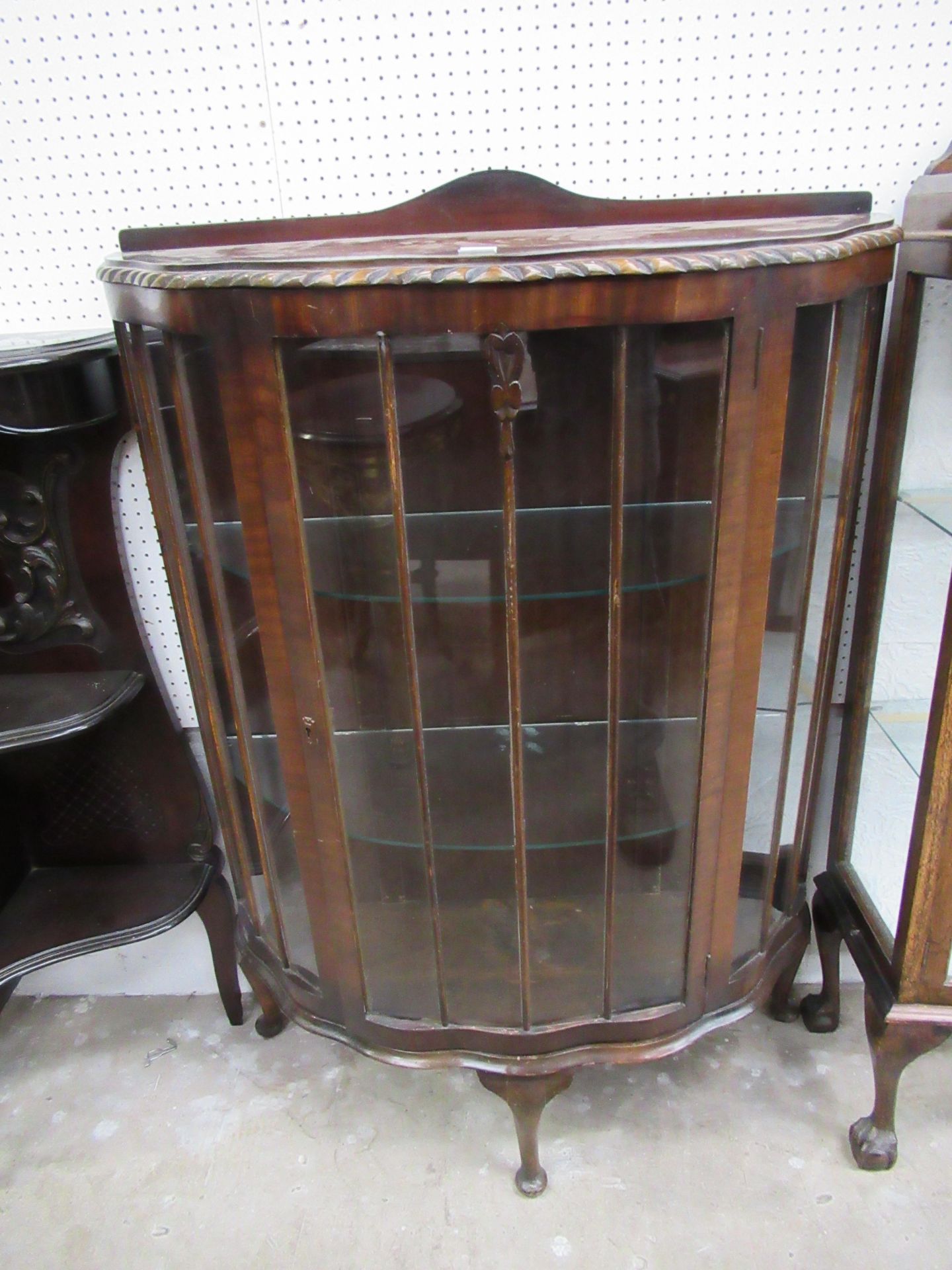 Bow fronted mahogany display cabinet