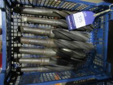 A tray of large tapered drill bits