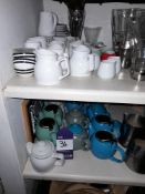 Quantity of teapots, milk jugs, saucers, to bar area