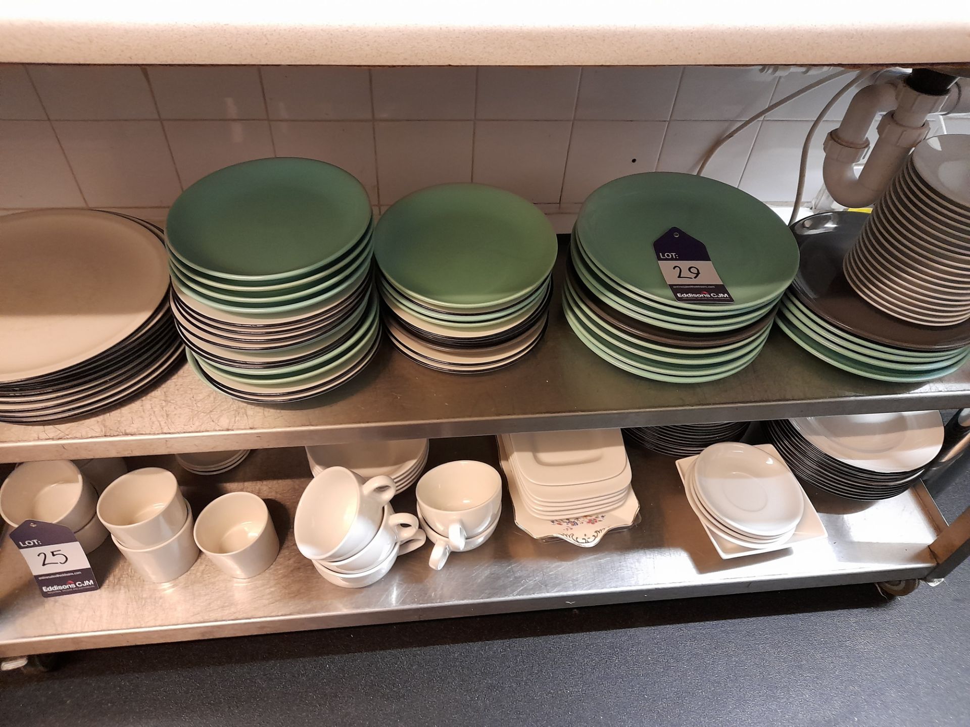 Assortment of crockery to trolley, to include plates, cups, saucers, etc