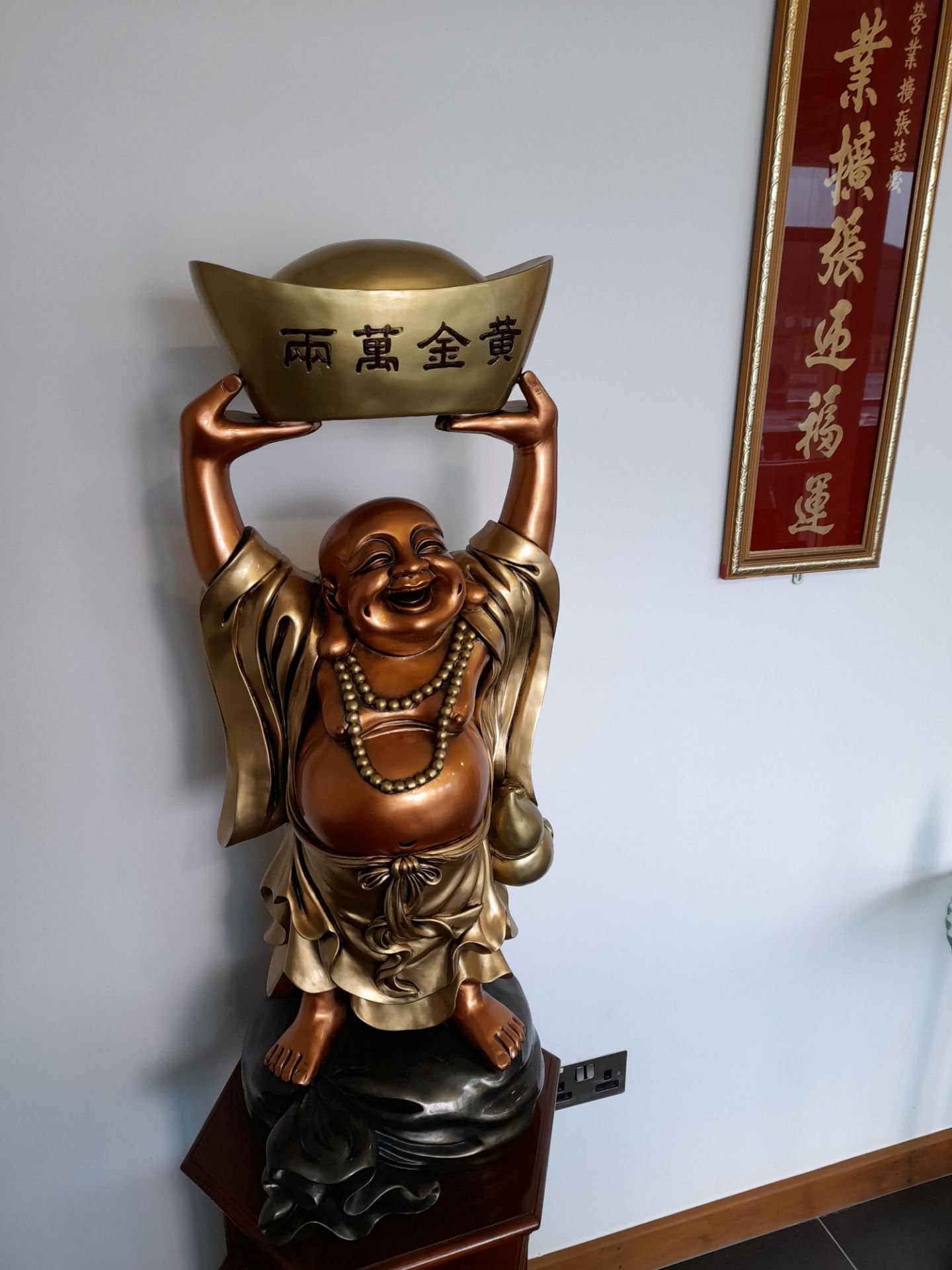 Oriental resin Buddha effigy, mounted on a rose wood effect plinth (1770 H) - Image 2 of 3