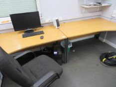 2x wavy edge desk, a chair and an electric heater