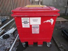 A red Taylor continental 1100 waste bin "forkliftable"