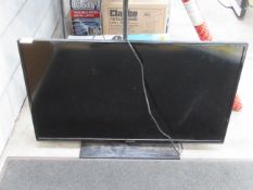 Panasonic 39" television with remote and cables