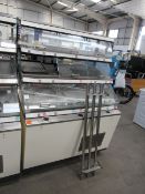 Three tier commercial catering display cabinet on castor wheels.
