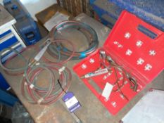 Assortment of welding accessories, including nozzles