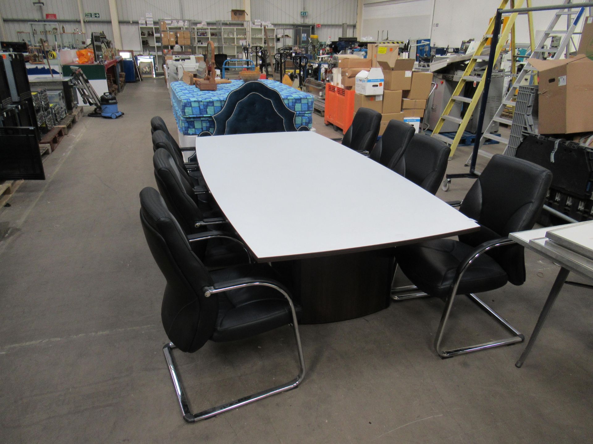 Contemporary boardroom table with 8 leather effect chrome framed cantilever chairs, approx. 2600 x 1