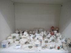 A selection of crested china with the Grimsby coat of arms