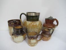 5x Royal Doulton/Lambeth stone items (3x jugs, 1x cup and 1x jar) and another similar drinking jug (