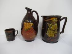 Royal Doulton "Enough as good as a feast" and "sporting squire" jugs (damaged) and a Royal Doulton c