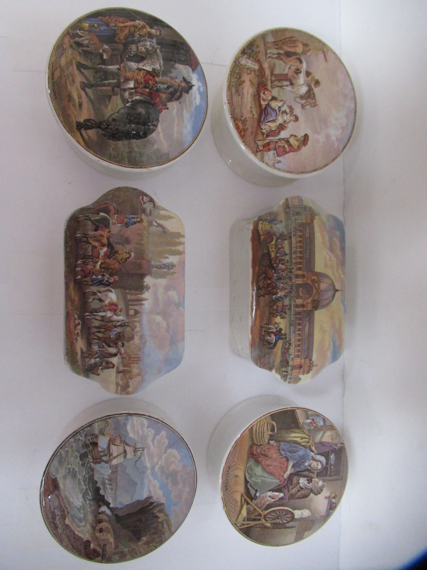 6x Prattware ceramic lids including 'Persuasion', 'The Chin-Chew River', 'Wouvermann Pinx', 'P. Wouv