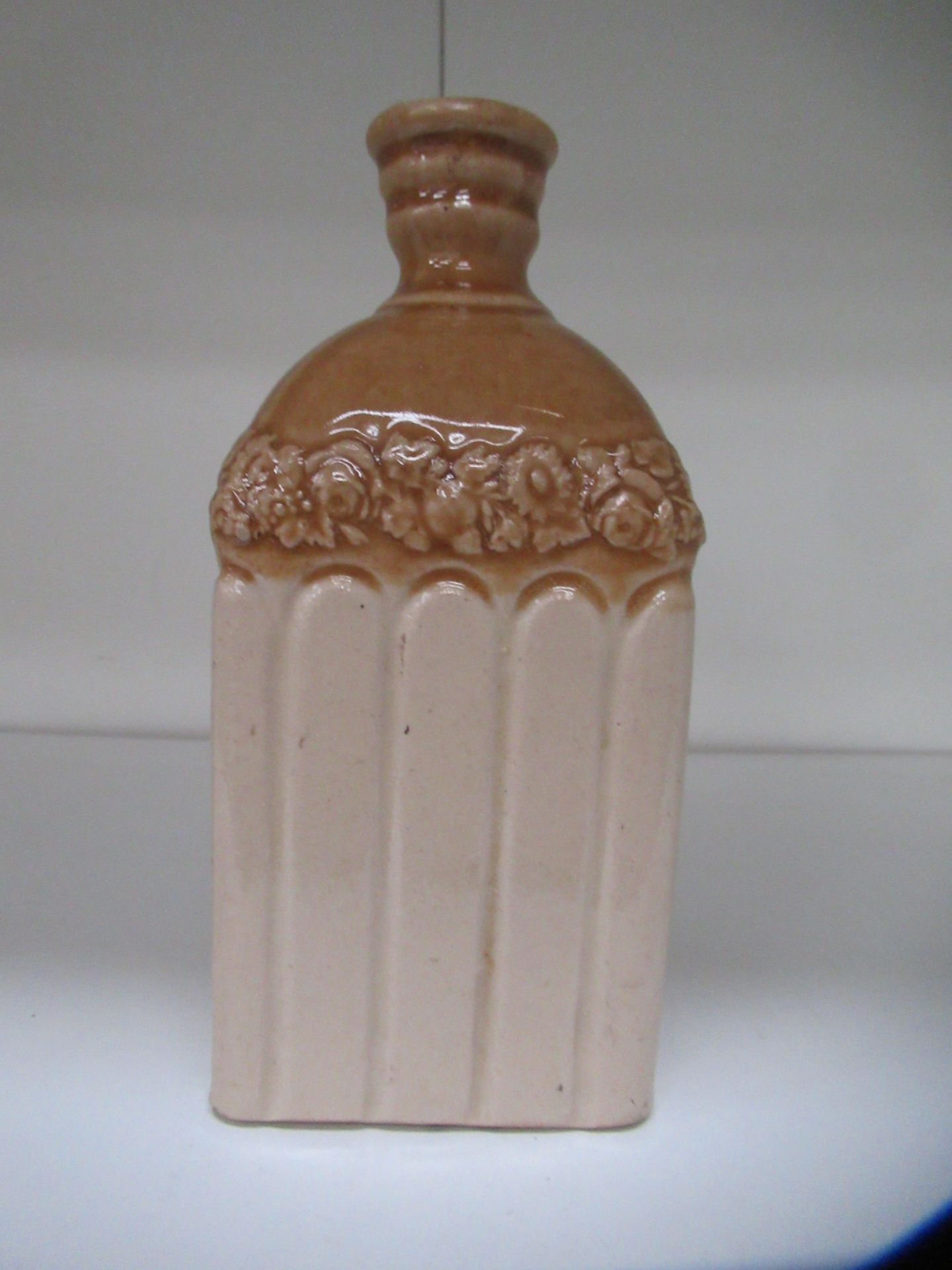 Stone bottle with floral detailing below bottle neck and 'G' stamp on handle - Image 2 of 8