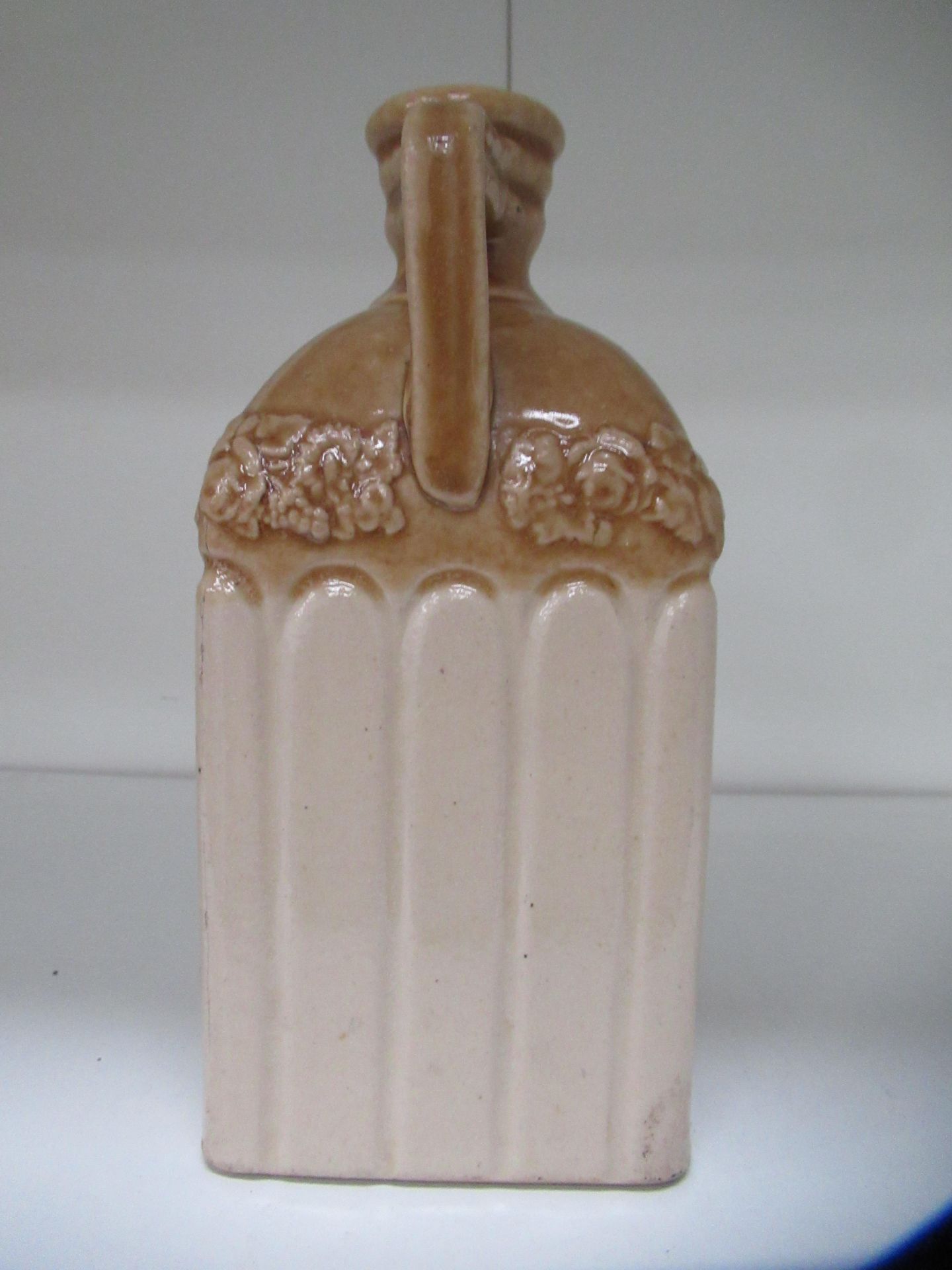 Stone bottle with floral detailing below bottle neck and 'G' stamp on handle - Image 5 of 8