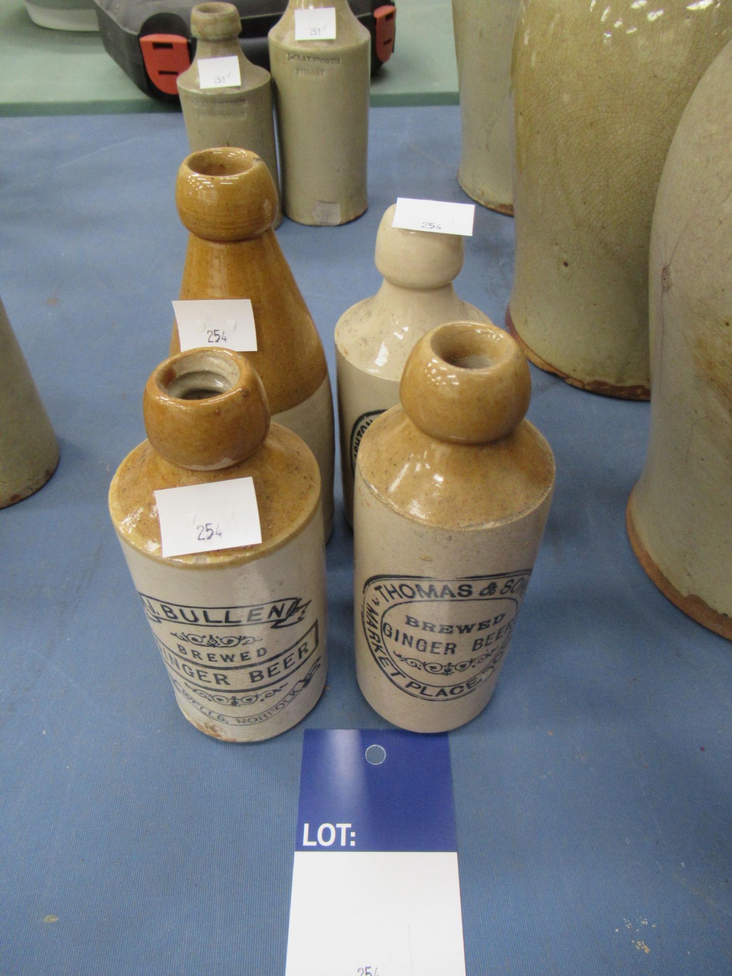 4x stone ginger beer bottles including W. Hill & Co- Grimsby, Thomas & Sons- Boston Market Place, J.