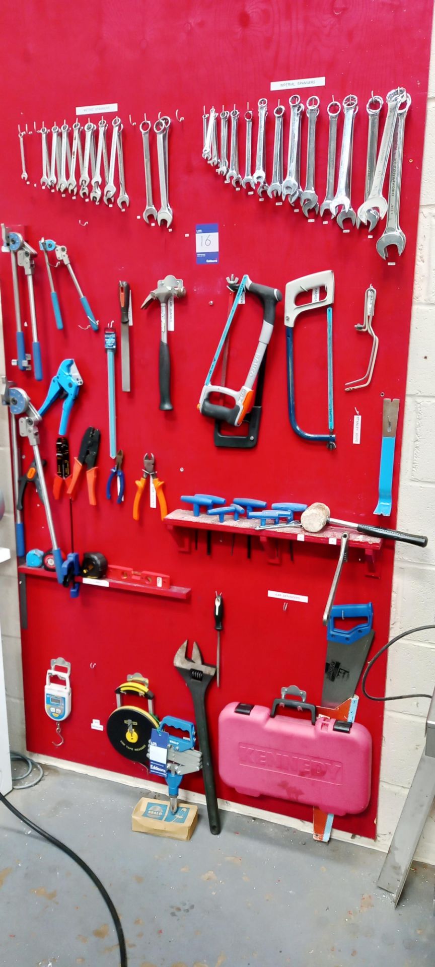 Quantity of Various Hand Tools to Wall to include Spanners, Handsaws, Heavy Duty Spanners, Various