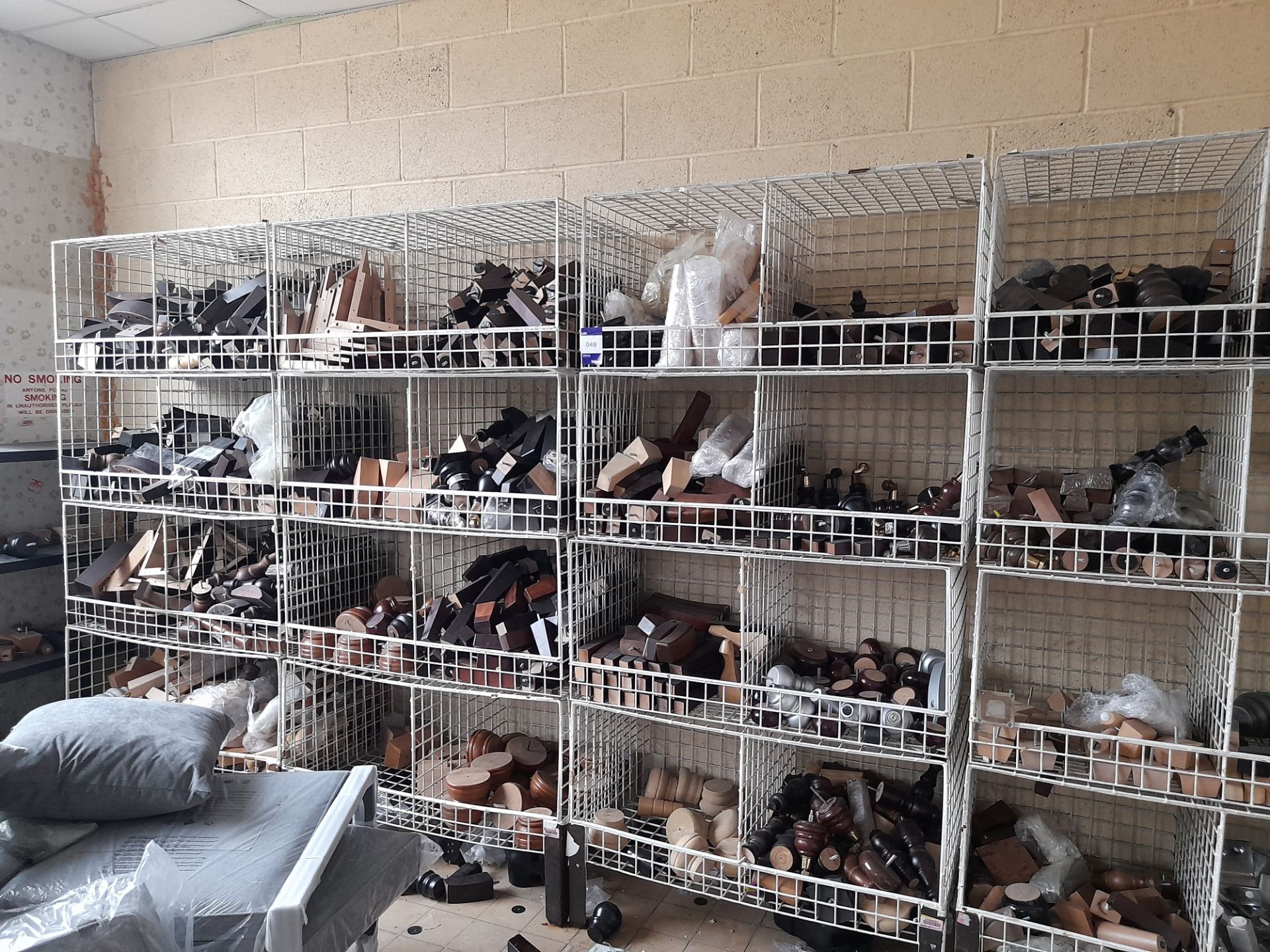 Large quantity of sofa feet, to store room (White cube racks included, all other contents excluded)