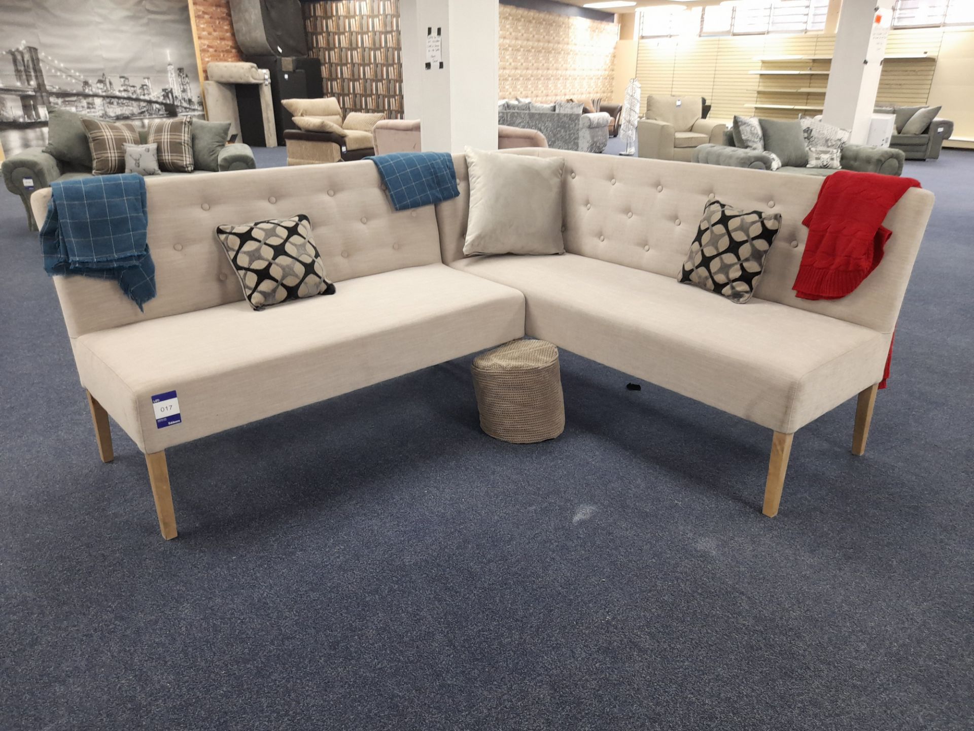 Two section/5 seat cream fabric upholstered bench type corner seating unit (Ex Display)
