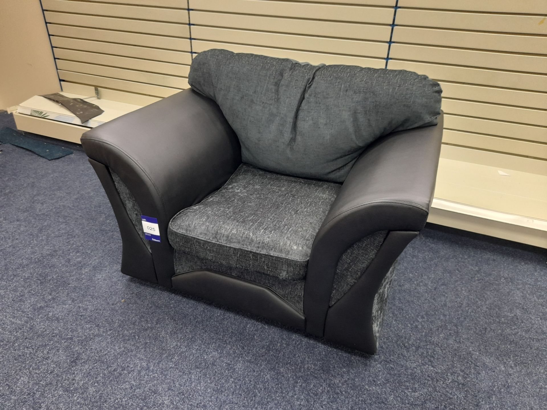 Black Leather/dark grey fabric upholstered, standard cushioned back armchair (Ex-Display)