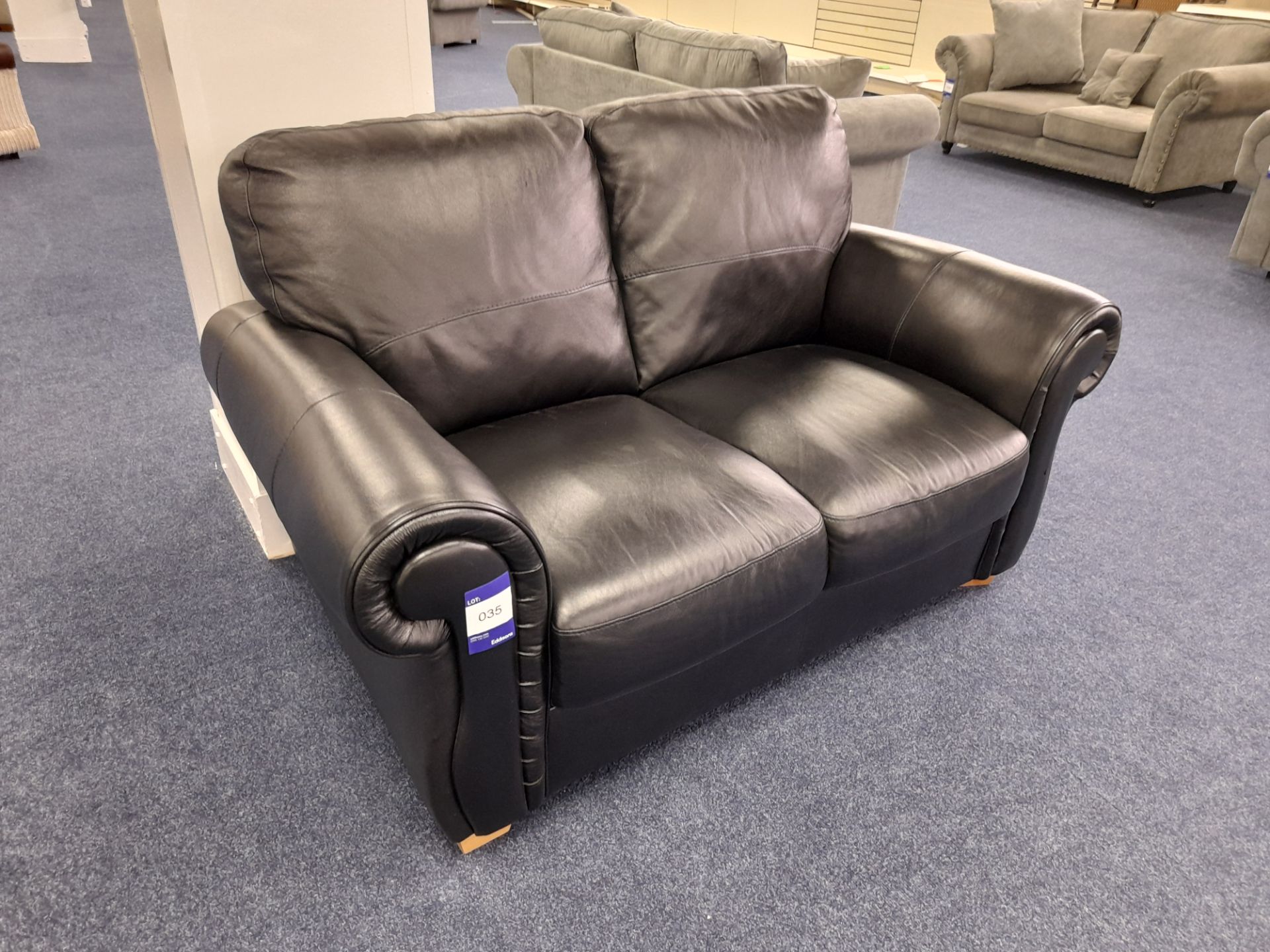 Black leather upholstered, 2 seater, standard cushioned back sofa (Ex-Display) - Image 5 of 5