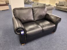 Black leather upholstered, 2 seater, standard cushioned back sofa (Ex-Display)