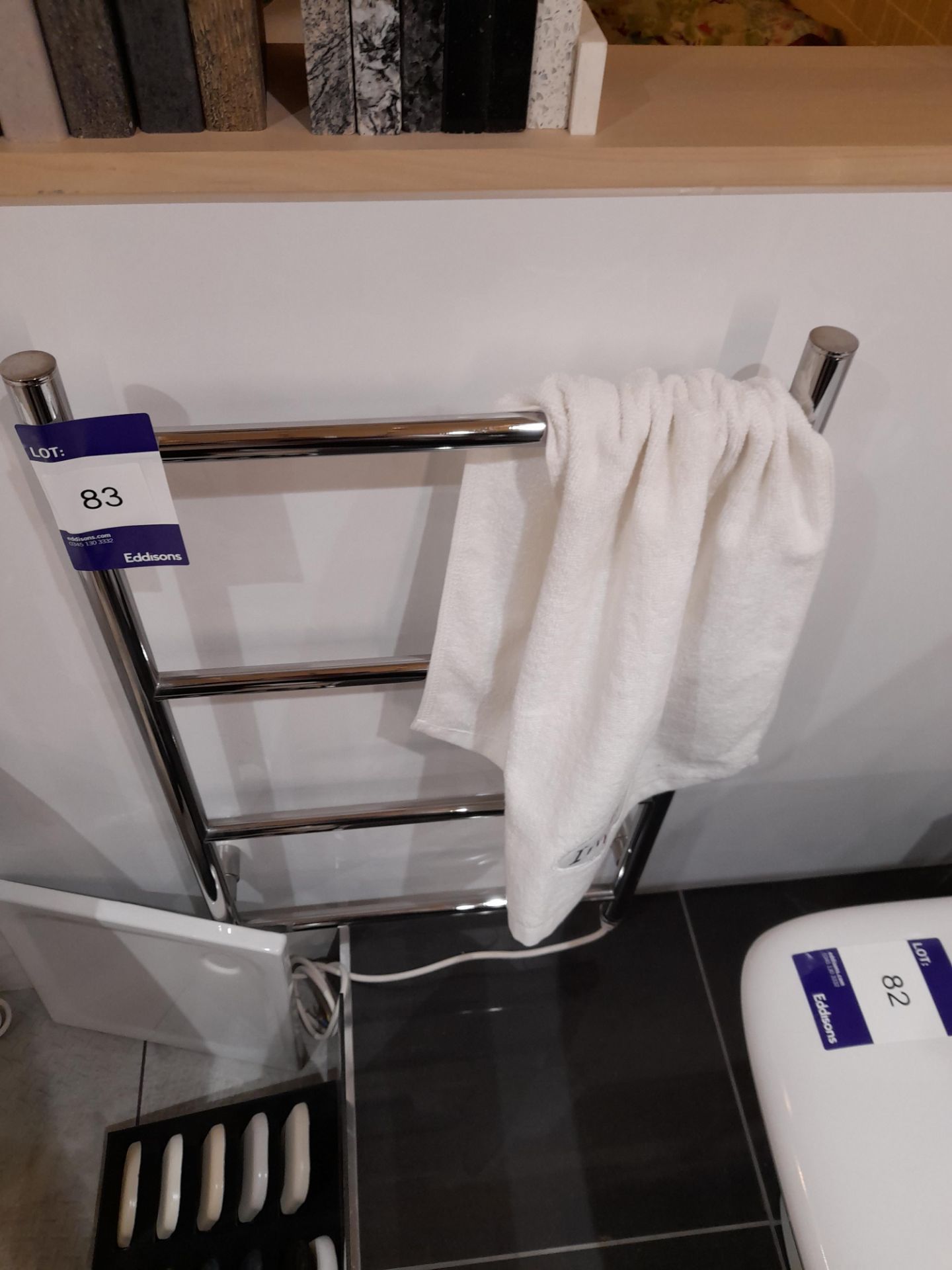 4 Stage wall mounted towel rail, to first floor sh