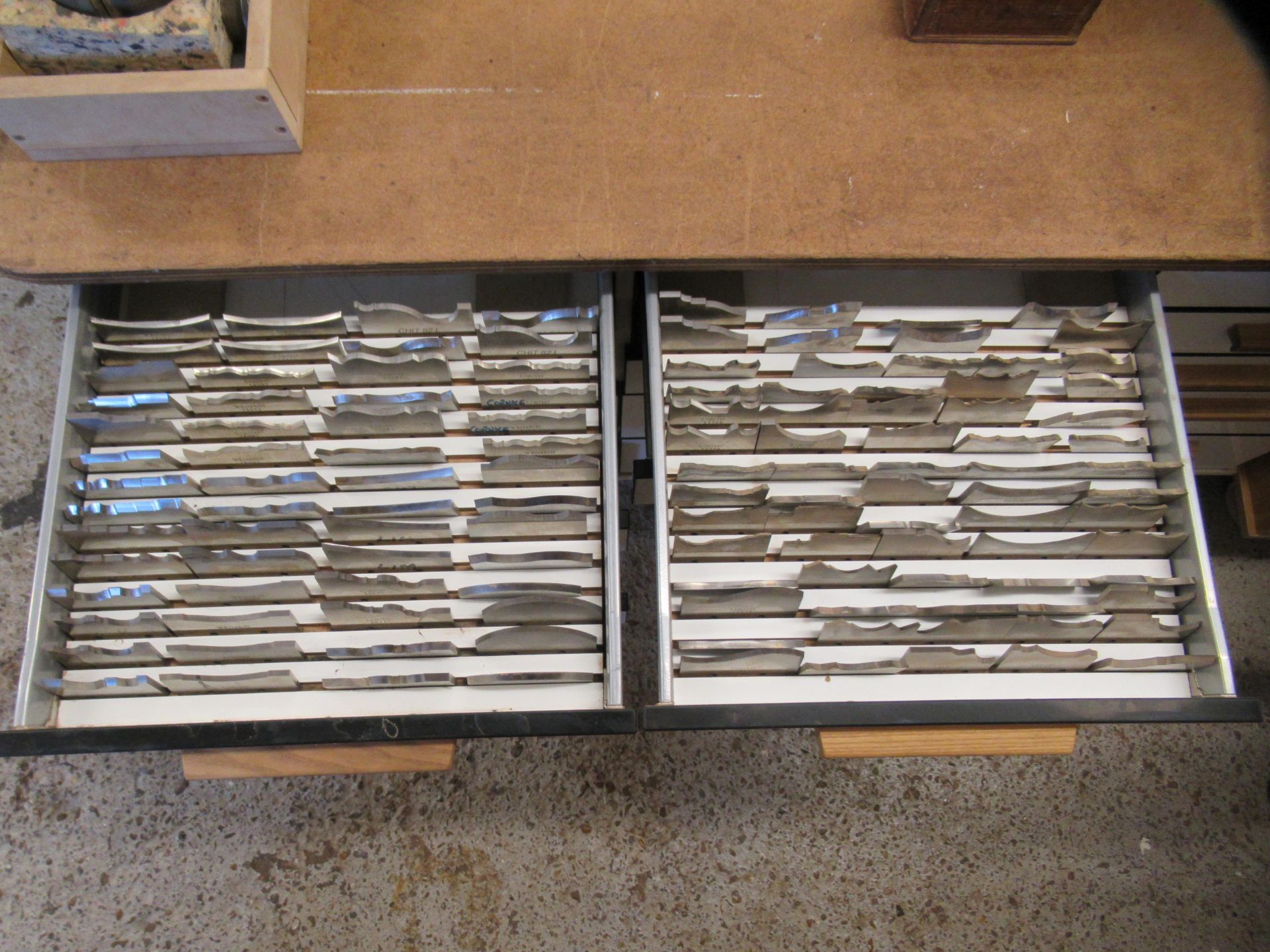 Two drawers of profile cutters and limiters.