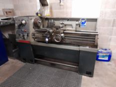 Colchester Master 2500 lathe, with wall mounted tool/chuck holder and contents (Please note that