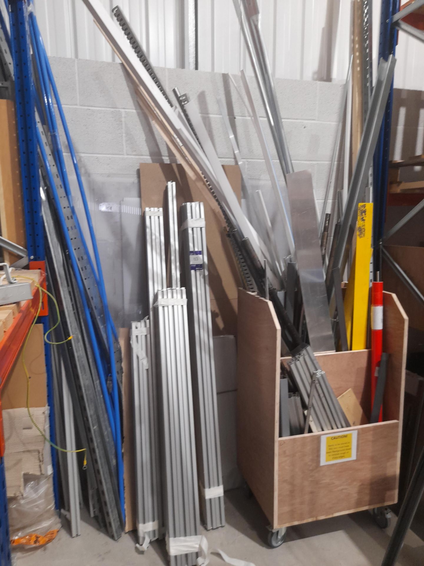 Quantity of various aluminium profiles, metal rods, threaded bar and plastic trunking to wall and